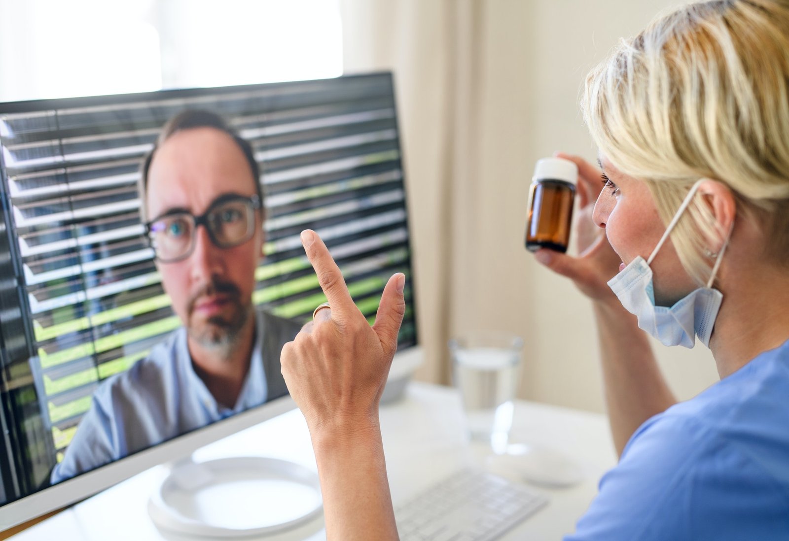 woman-doctor-having-video-call-with-patient-on-laptop-online-consultation-concept.jpg
